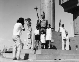 Tourists taking photos by the Roman statues at Caesars Palace, 1966 
